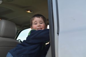 Vacation Minimalists Benjamin hanging out in the truck before we go! 